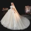 Illusion Champagne Lace Flower Sequins Wedding Dresses 2021 Ball Gown High Neck Ruffle Short Sleeve Backless Cathedral Train Wedding