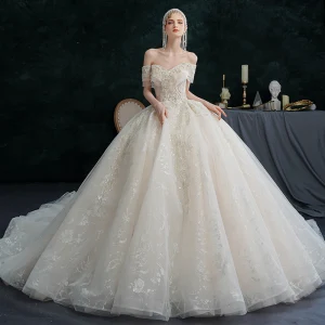 Illusjon Champagne Brudekjoler 2021 Ballkjole Av Skulderen Beading Perle Rhinestone Paljetter Korte Ermer Ryggløse Royal Train Bryllup