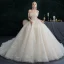 Illusion Champagne Wedding Dresses 2021 Ball Gown Off-The-Shoulder Beading Pearl Rhinestone Sequins Short Sleeve Backless Royal Train Wedding