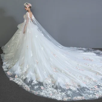 Luxury Gorgeous Ivory Wedding Dresses 2018 Ball Gown Lace Appliques Rhinestone Cascading Ruffles Scoop Neck Backless Sleeveless Watteau Train Wedding