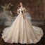 Charmant Champagne Robe De Mariée 2020 Princesse Encolure Dégagée Perlage Paillettes En Dentelle Fleur Manches Courtes Dos Nu Cathedral Train