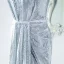 Scintillantes Argenté Paillettes Robe De Soirée 2024 Trompette / Sirène Titulaire Sans Manches Dos Nu Train De Balayage Soirée Robe De Ceremonie