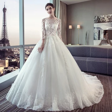 Chic Beautiful Ivory Wedding Dresses 2018 Ball Gown See Through Lace Appliques Scoop Neck Backless 3 4 Sleeve Court Train Wedding