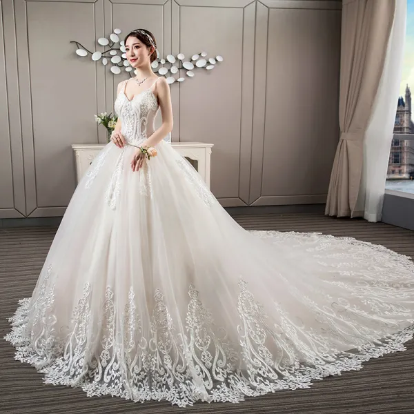 Luxury / Gorgeous Ivory Wedding Dresses 2018 Ball Gown Lace Appliques Beading Pearl Rhinestone Spaghetti Straps Backless Sleeveless Royal Train Wedding