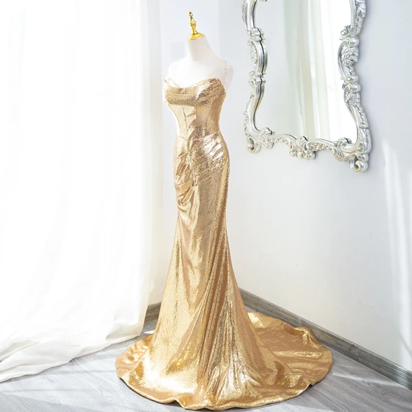 Scintillantes Doré Paillettes Robe De Soirée 2024 Trompette / Sirène Bustier Sans Manches Dos Nu Train De Balayage Soirée Robe De Ceremonie
