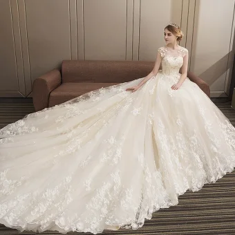 Mode Champagner Brautkleider 2018 Ballkleid Mit Spitze Applikationen Perlenstickerei Pailletten Rundhalsausschnitt Rückenfreies Ärmellos Königliche Schleppe Hochzeit