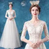 Affordable Illusion Ivory Wedding Dresses 2020 A-Line / Princess V-Neck Lace Flower 1/2 Sleeves Floor-Length / Long