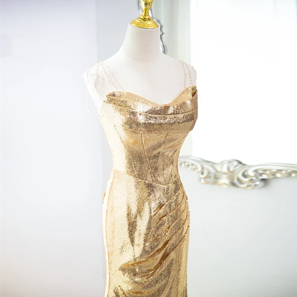 Scintillantes Doré Paillettes Robe De Soirée 2024 Trompette / Sirène Bustier Sans Manches Dos Nu Train De Balayage Soirée Robe De Ceremonie