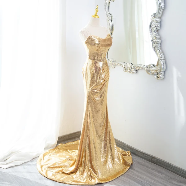 Scintillantes Doré Paillettes Robe De Soirée 2024 Trompette / Sirène Bustier Sans Manches Dos Nu Train De Balayage Soirée Robe De Ceremonie