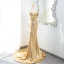 Scintillantes Doré Paillettes Robe De Soirée 2024 Trompette / Sirène Bustier Sans Manches Dos Nu Train De Balayage Soirée Robe De Ceremonie