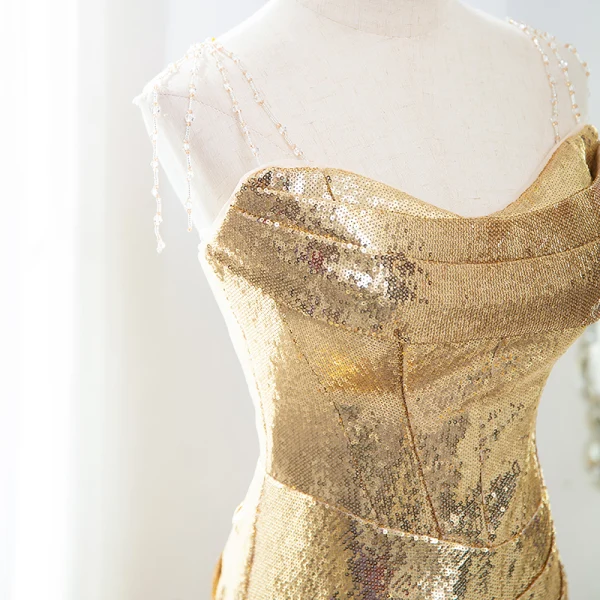 Scintillantes Doré Paillettes Robe De Soirée 2024 Trompette / Sirène Bustier Sans Manches Dos Nu Train De Balayage Soirée Robe De Ceremonie