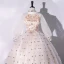 Élégant Champagne Robe De Bal 2022 Robe Boule Encolure Dégagée Étoile En Dentelle Perlage Perle Paillettes Manches Longues Longue Robe De Ceremonie