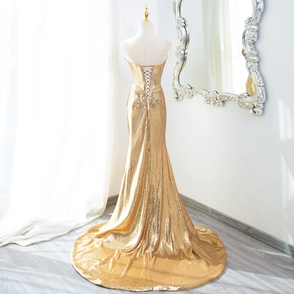 Scintillantes Doré Paillettes Robe De Soirée 2024 Trompette / Sirène Bustier Sans Manches Dos Nu Train De Balayage Soirée Robe De Ceremonie