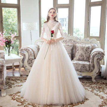 Luxe Champagne Robe De Mariée 2018 Princesse Transparentes Perlage Cristal Faux Diamant En Dentelle Fleur Noeud Encolure Dégagée Dos Nu 1 2 Manches Train De Balayage Mariage
