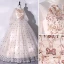 Élégant Champagne Robe De Bal 2022 Robe Boule Encolure Dégagée Étoile En Dentelle Perlage Perle Paillettes Manches Longues Longue Robe De Ceremonie