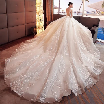Étourdissant Ivoire Robe De Mariée 2017 Princesse Encolure Dégagée Manches Longues Appliques En Dentelle Fleur Perlage Perle Organza Chapel Train