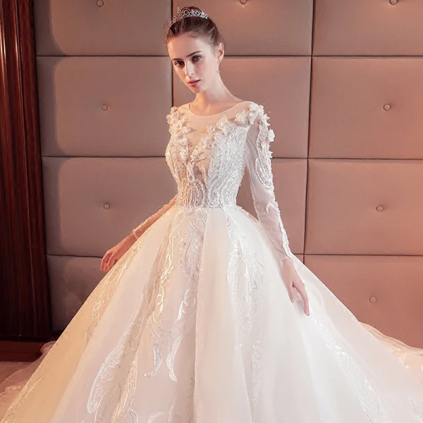 Étourdissant Ivoire Robe De Mariée 2017 Princesse Encolure Dégagée Manches Longues Appliques En Dentelle Fleur Perlage Perle Organza Chapel Train