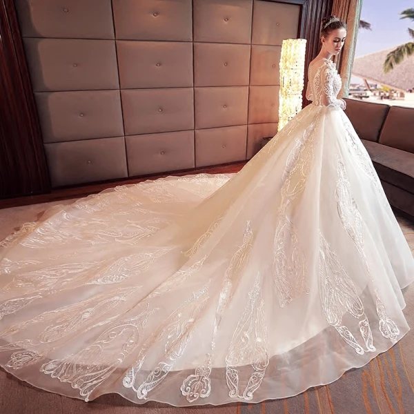 Étourdissant Ivoire Robe De Mariée 2017 Princesse Encolure Dégagée Manches Longues Appliques En Dentelle Fleur Perlage Perle Organza Chapel Train