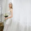 Chic / Beautiful Beach Wedding Dresses 2017 White Trumpet / Mermaid Court Train Sleeveless Spaghetti Straps V-Neck Backless Sash Pearl Lace Appliques