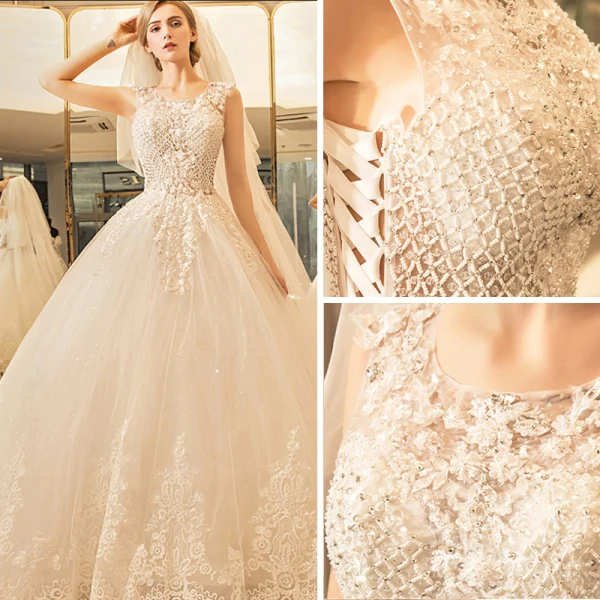 Chic / Beautiful Sparkly Wedding Dresses 2017 Scoop Neck Sleeveless Church Ivory Ball Gown Lace Appliques Crystal Rhinestone Floor-Length / Long