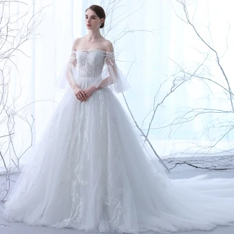 Élégant Ivoire Transparentes Robe De Mariée 2018 Princesse De L Épaule 3 4 Manches Dos Nu Appliques En Dentelle Volants Cathedral Train