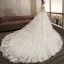 Stunning Champagne Wedding Dresses 2018 Ball Gown Lace Appliques Pearl Scoop Neck Backless Long Sleeve Royal Train Wedding