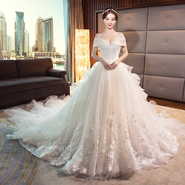 Stunning Champagne Wedding Dresses 2018 Ball Gown Lace Appliques Pearl Sequins Off-The-Shoulder Backless Sleeveless Royal Train Wedding