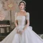 Simple Haut de Gamme Blanche Glitter Robe De Mariée 2021 Robe Boule Encolure Dégagée Manches Courtes Dos Nu Noeud Royal Train Mariage