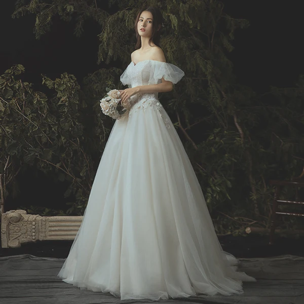Eleganta Elfenben Korsett Bröllopsklänningar 2019 Prinsessa Spets Appliqués Beading Kristall Av Axeln Halterneck Ärmlös Chapel Train