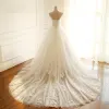 Elegant Ivory Wedding Dresses 2018 Ball Gown Lace Appliques Crystal Sweetheart Backless Sleeveless Cathedral Train Wedding