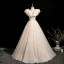 Elegant Champagne Appliques Prom Dresses 2025 Ball Gown Ruffle V-Neck Sleeveless Backless Floor-Length / Long Prom Formal Dresses