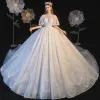 Luxury / Gorgeous Ivory Wedding Dresses 2021 Ball Gown V-Neck Beading Rhinestone Sequins Short Sleeve Backless Royal Train Wedding