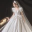 Style Victorien Vintage / Originale Ivoire Satin Robe De Mariée 2021 Robe Boule Perle Encolure Carrée Gonflée Manches Courtes Noeud Dos Nu Royal Train Mariage