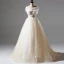Romantic A-Line / Princess Champagne Tulle Wedding Dresses 2017 Appliques Lace Flower Backless Court Train Sleeveless