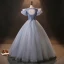 Vintage / Retro Quinceañera Prom Dresses 2024 Sky Blue Crossed Straps Beading Pearl Tulle Cap Sleeves Ball Gown Formal Dresses