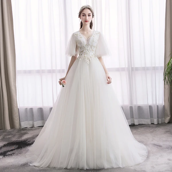 Élégant Ivoire Robe De Mariée 2019 Princesse V-Cou En Dentelle Fleur Manches Courtes Dos Nu Tribunal Train