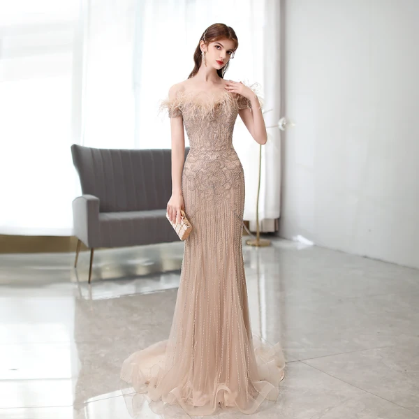 Haut de Gamme Fabuleux Champagne Fait main Perlage Faux Diamant Robe De Soirée 2021 Trompette / Sirène De l'épaule Gland Sans Manches Train De Balayage Robe De Ceremonie