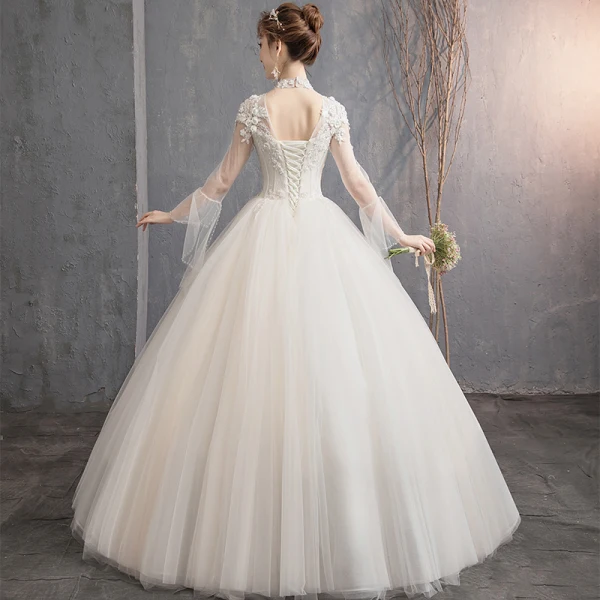 Élégant Champagne Robe De Mariée 2019 Princesse Col Haut Appliques En Dentelle Fleur Perlage Perle Paillettes Manches Longues Dos Nu Longue