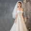 Style Audrey Hepburn Champagne Robe De Mariée 2019 Princesse Bustier Perlage Paillettes Appliques En Dentelle Fleur Sans Manches Dos Nu Noeud Chapel Train