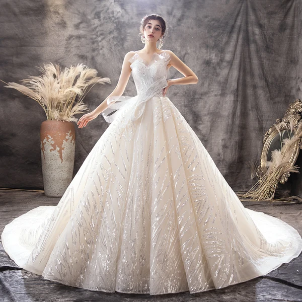Luxury / Gorgeous Champagne Wedding Dresses 2019 Ball Gown Spaghetti Straps Sequins Sleeveless Backless Bow Royal Train