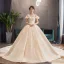 Luxe Champagne Robe De Mariée 2019 Robe Boule Encolure Dégagée Noeud En Dentelle Fleur Manches Courtes Dos Nu Royal Train