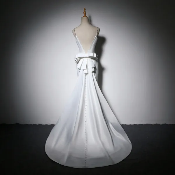 Elegante Ivory / Creme Abendkleider 2018 Mermaid Schleife Spaghettiträger Rückenfreies Ärmellos Sweep / Pinsel Zug Festliche Kleider