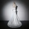 Elegant Ivory Evening Dresses  2018 Trumpet / Mermaid Bow Spaghetti Straps Backless Sleeveless Sweep Train Formal Dresses