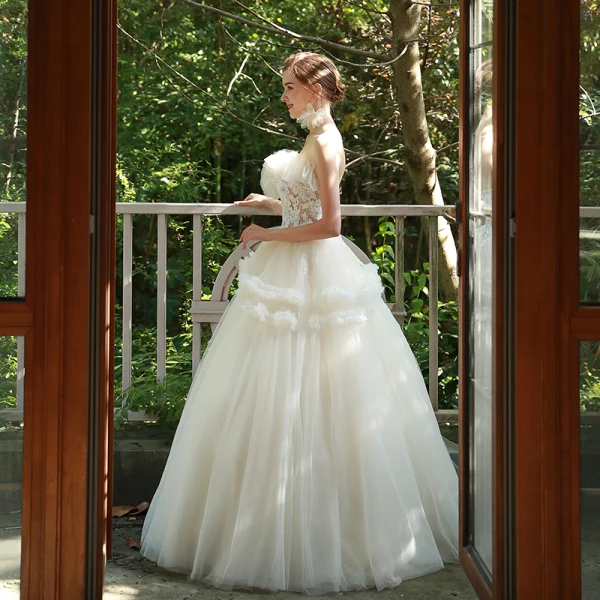 Charmant Ivoire Robe De Mariée 2019 Princesse Volants Bustier Appliques Paillettes En Dentelle Fleur Sans Manches Dos Nu Longue