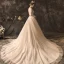 Élégant Champagne Robe De Mariée 2019 Princesse Encolure Dégagée En Dentelle Fleur Manches Longues Dos Nu Chapel Train