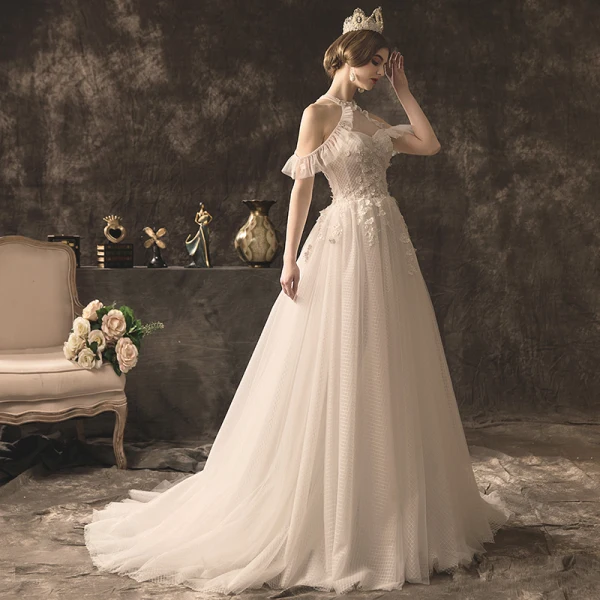Charmant Ivory / Creme Brautkleider / Hochzeitskleider 2019 A Linie Neckholder Perlenstickerei Pailletten Spitze Blumen Ärmellos Rückenfreies Hof-Schleppe