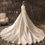 Élégant Ivoire Robe De Mariée 2019 Princesse Encolure Dégagée Noeud En Dentelle Fleur Manches Longues Dos Nu Cathedral Train