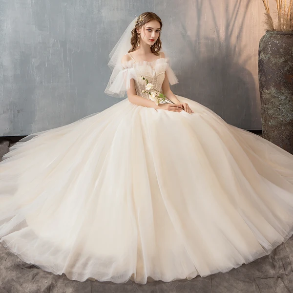 Élégant Champagne Robe De Mariée 2019 Princesse Bretelles Spaghetti Perlage Paillettes Volants Manches Courtes Dos Nu Longue