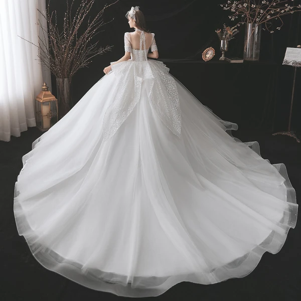 Mode Ivoire Glitter Robe De Mariée 2021 Robe Boule Encolure Dégagée Perlage Faux Diamant Manches Courtes Dos Nu Royal Train Mariage