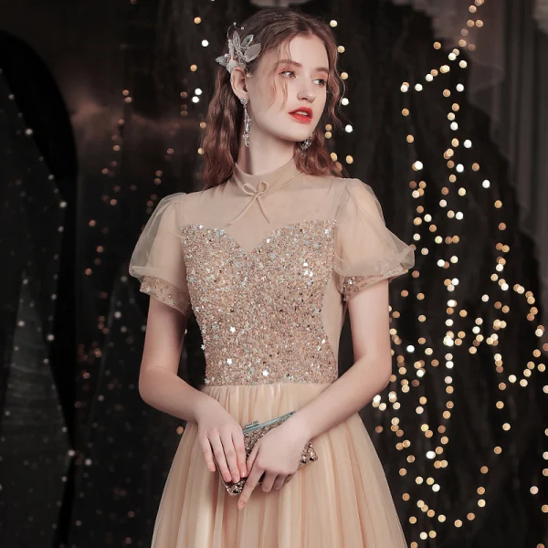 Charmant Doré Étoile Paillettes Robe De Bal 2021 Princesse Col Haut Perlage Manches Courtes Dos Nu Noeud Longue Promo Robe De Ceremonie